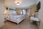 Third bedroom has a king bed and TV